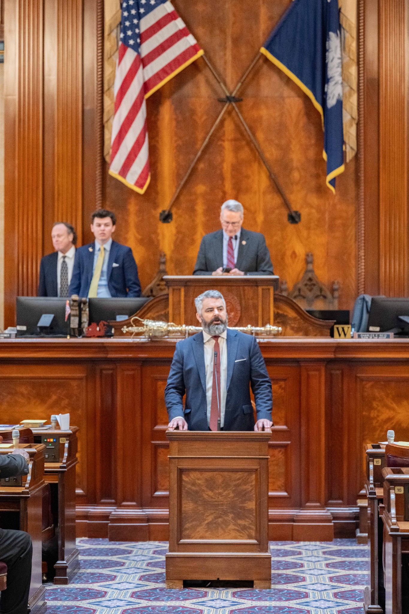 Micah Caskey speaking from the House podium